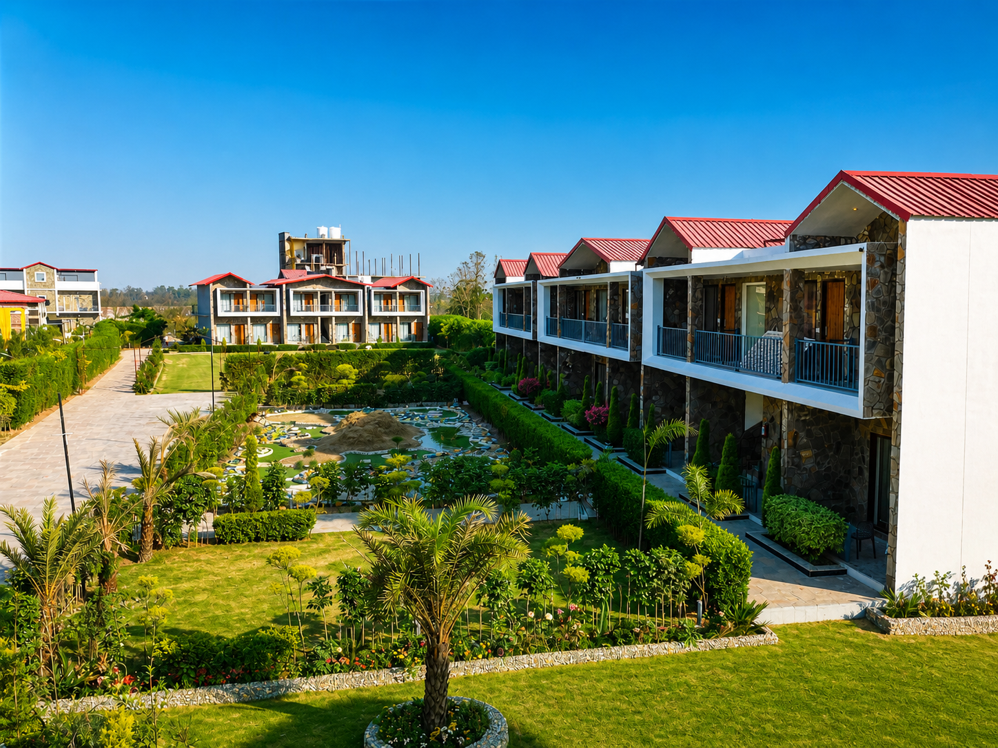 Lawn and outdoor area at Corbett River Heart Resort